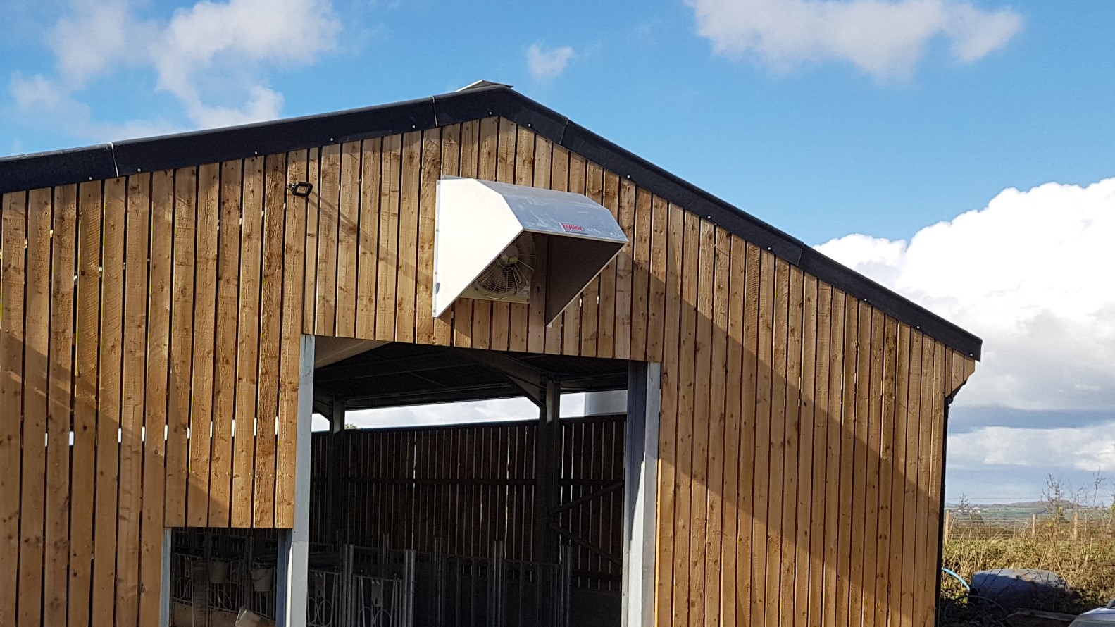 The external apex end of a shed. Showing a cowl pointing downwards positioned below the ridge.